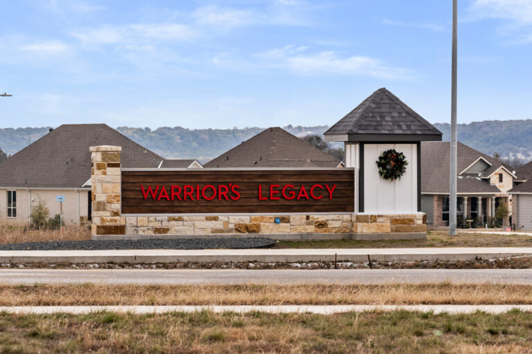 Entrance sign for Warrior's Legacy residential community, developed by Martin Investment Group